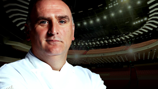 An image of Jose Andres wearing a white chef's jacket sits on a background showing the new Tanger Center auditorium.