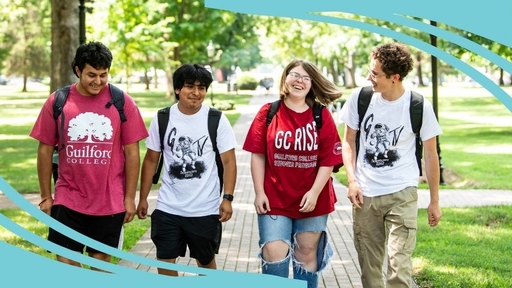 Four students in the Rise program walk through the Quad.