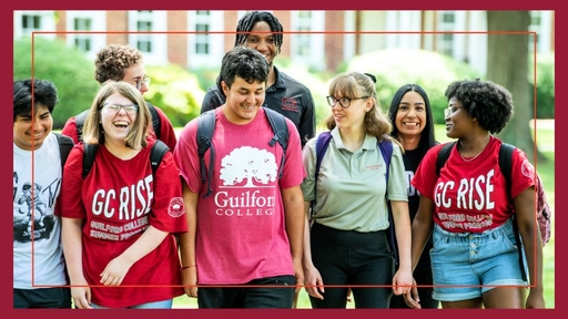 A group of eight GC Rise students walk across the Quad together.