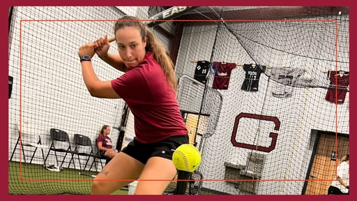 Guilford’s Ally Morales ‘23 practices in the Quakers’ new softball Hitting Annex, which opens in April. 