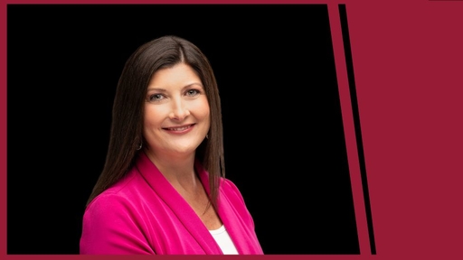 Whitney Oakley in a pink blazer