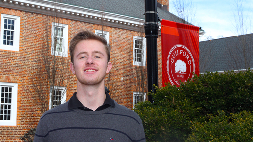 Jacob Mitchell in front of Founders Hall