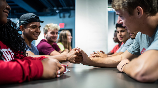 A group of students around a table in Milner Hall