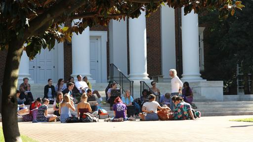 Eric Mortenson's religious studies class outside in front of Dana Auditorium