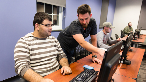 Students work on computer in a CTIS classroom.