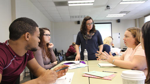 A professor leads a discussion in a Psychology class.