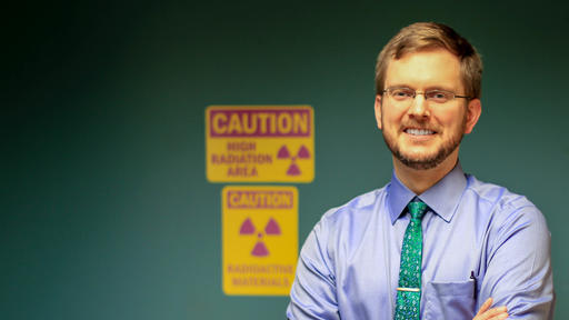 Portrait of Ryan Best '03, who fights cancer as a medical physicist.
