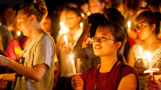 Guilford College first year students participate in a tradition called the Passing of the Light. 