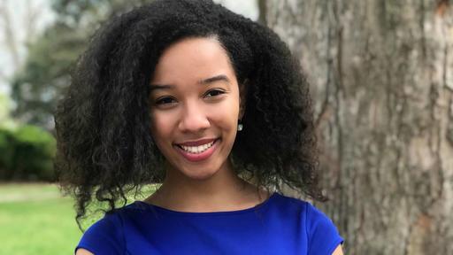 Amelia Wellman poses for a portrait on campus.