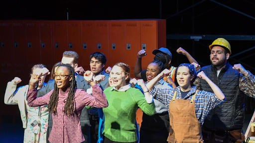 Students perform in a scene from Working.