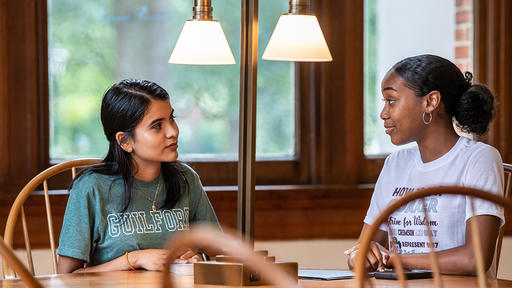 Students study together in the Carnegie Room of Hege Library.