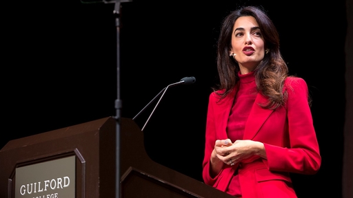 Amal Clooney speak on stage at the Bryan Series.